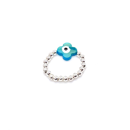 Evil eye ring with a sterling silver 3mm ball bead stretch band and a blue shell evil eye.