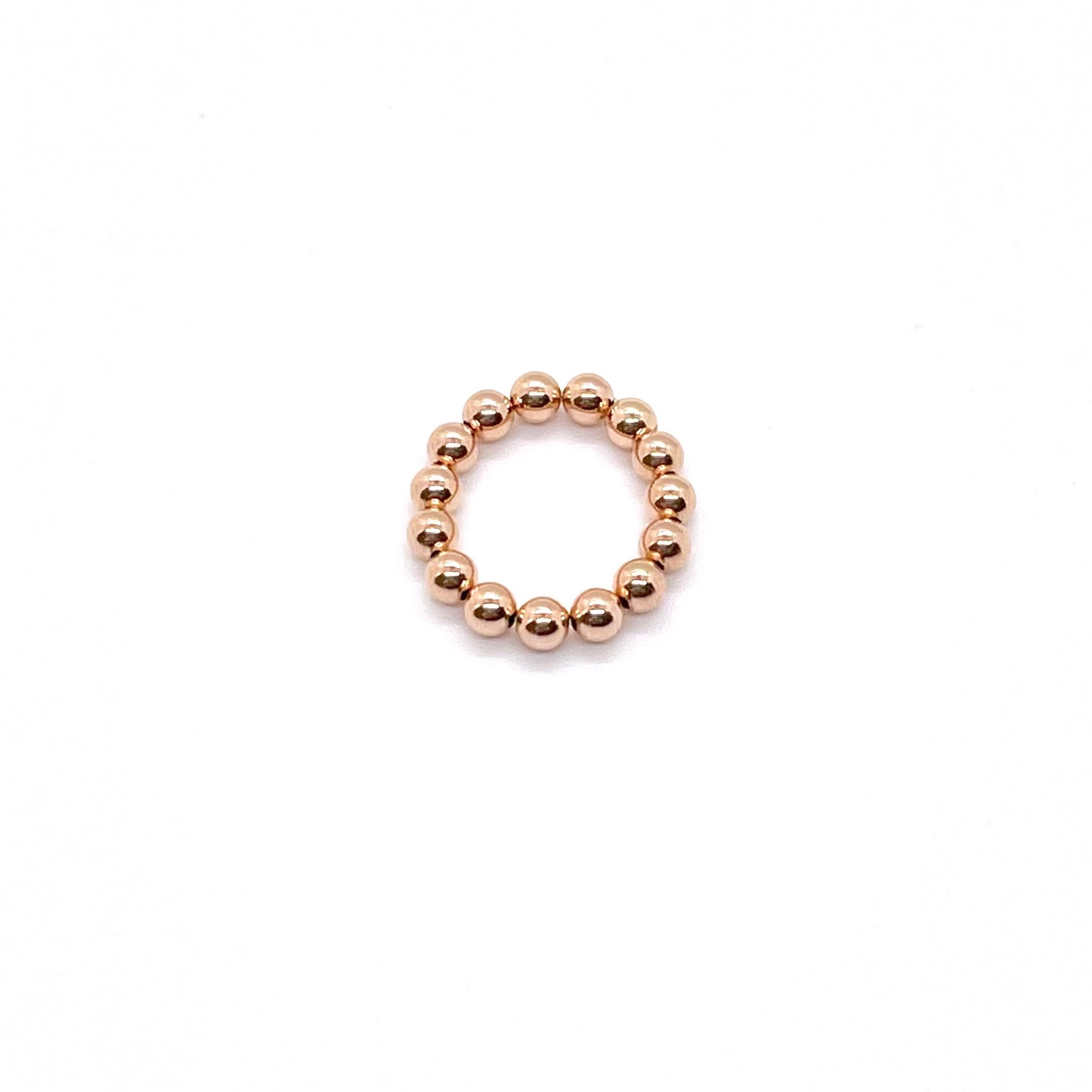Gold bead ring with 4mm rose gold filled waterproof beads on elastic stretch cord.