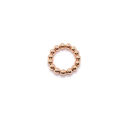 Gold bead ring with 4mm rose gold filled waterproof beads on elastic stretch cord.