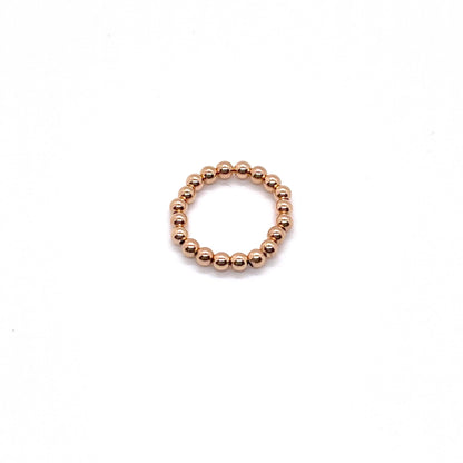 Gold beaded ring with 3mm rose gold filled waterproof beads on elastic stretch cord.