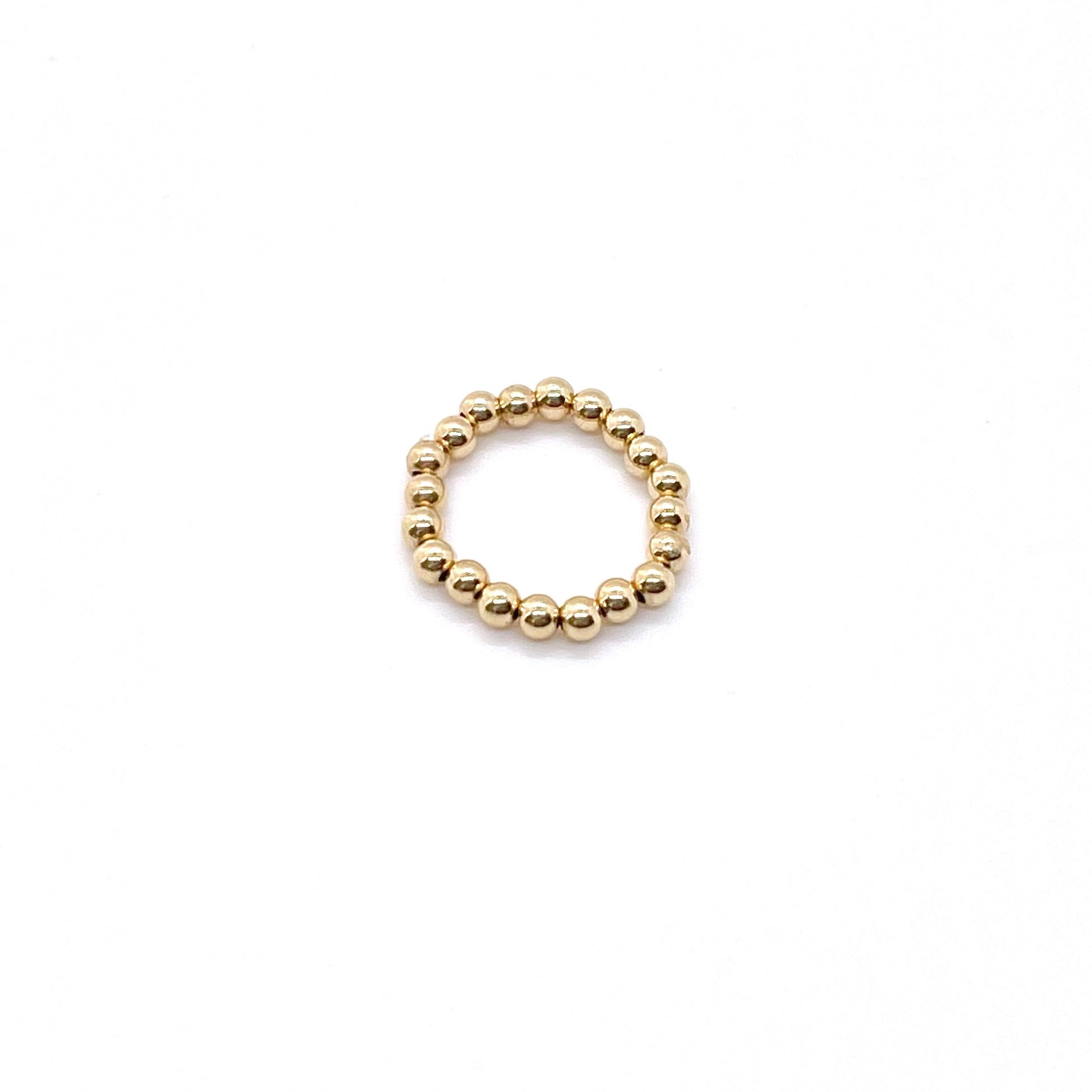 Gold stretch ring with 3mm 14K gold filled waterproof beads on elastic stretch cord.