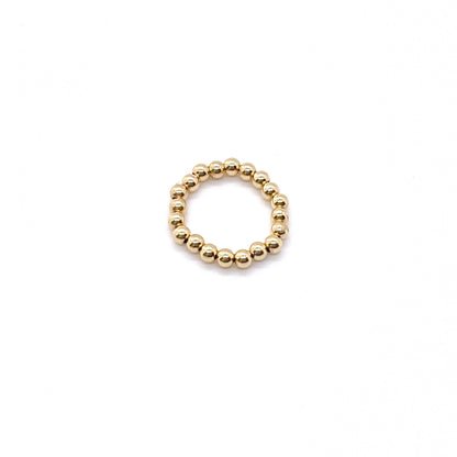 Gold stretch ring with 3mm 14K gold filled waterproof beads on elastic stretch cord.