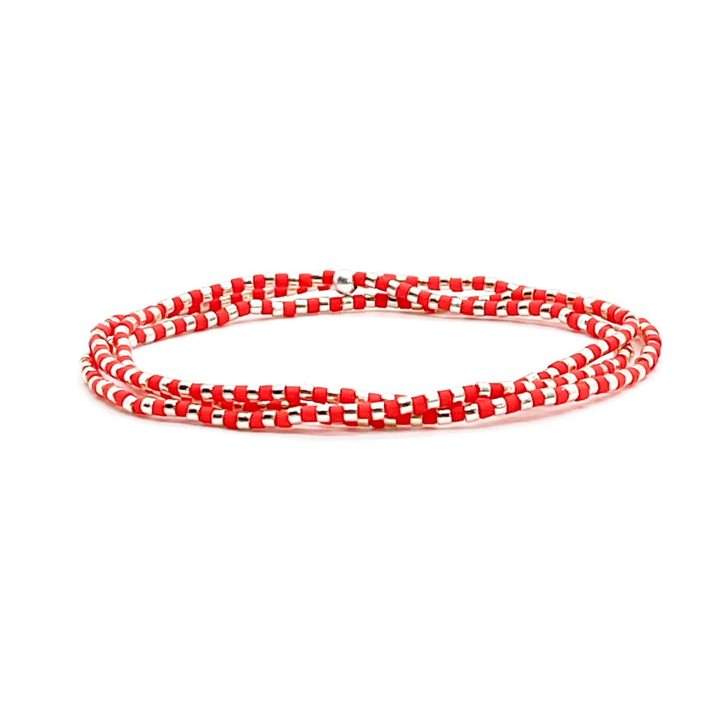 Beaded wrap bracelet with tiny red and silver-tone glass seed beads on stretch cord.