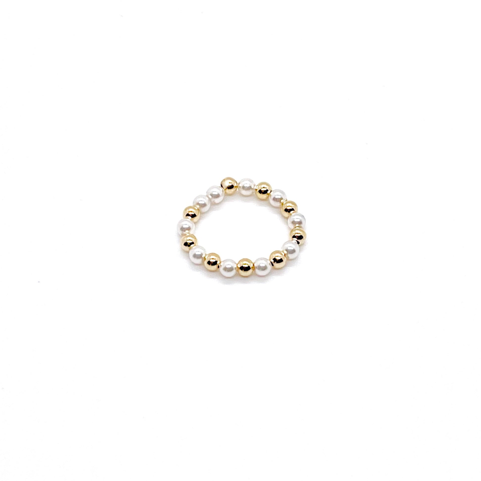 Pearl stackable ring with alternating 3mm 14K gold filled balls and crystal pearl beads on a stretch cord.