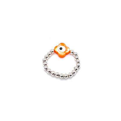 Sterling silver evil eye ring with a 3mm ball bead stretch band and orange shell evil eye bead.