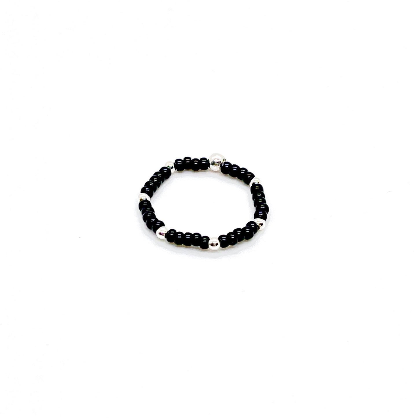 Stretch ring | Black seed bead ring with 2mm sterling silver accent ball beads.