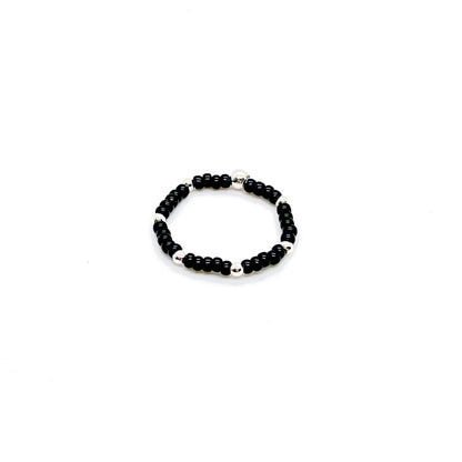 Stretch ring | Black seed bead ring with 2mm sterling silver accent ball beads.