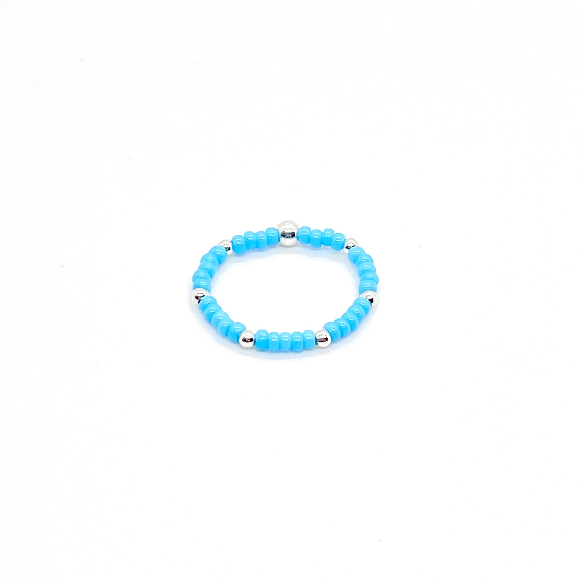 Stretch ring | Blue seed bead ring with 2mm silver ball accent beads.