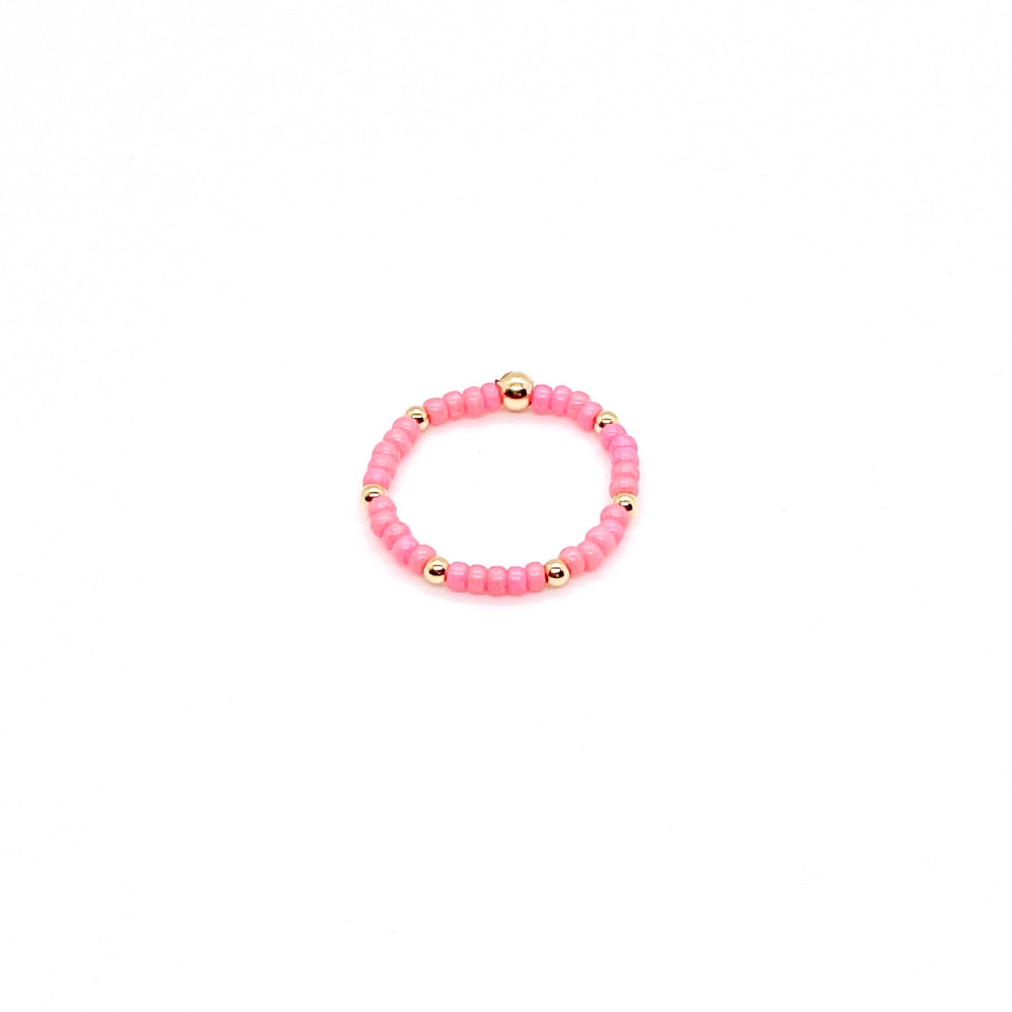 Stretch ring with pink seed beads and 2mm 14k gold-fill waterproof accent ball beads.