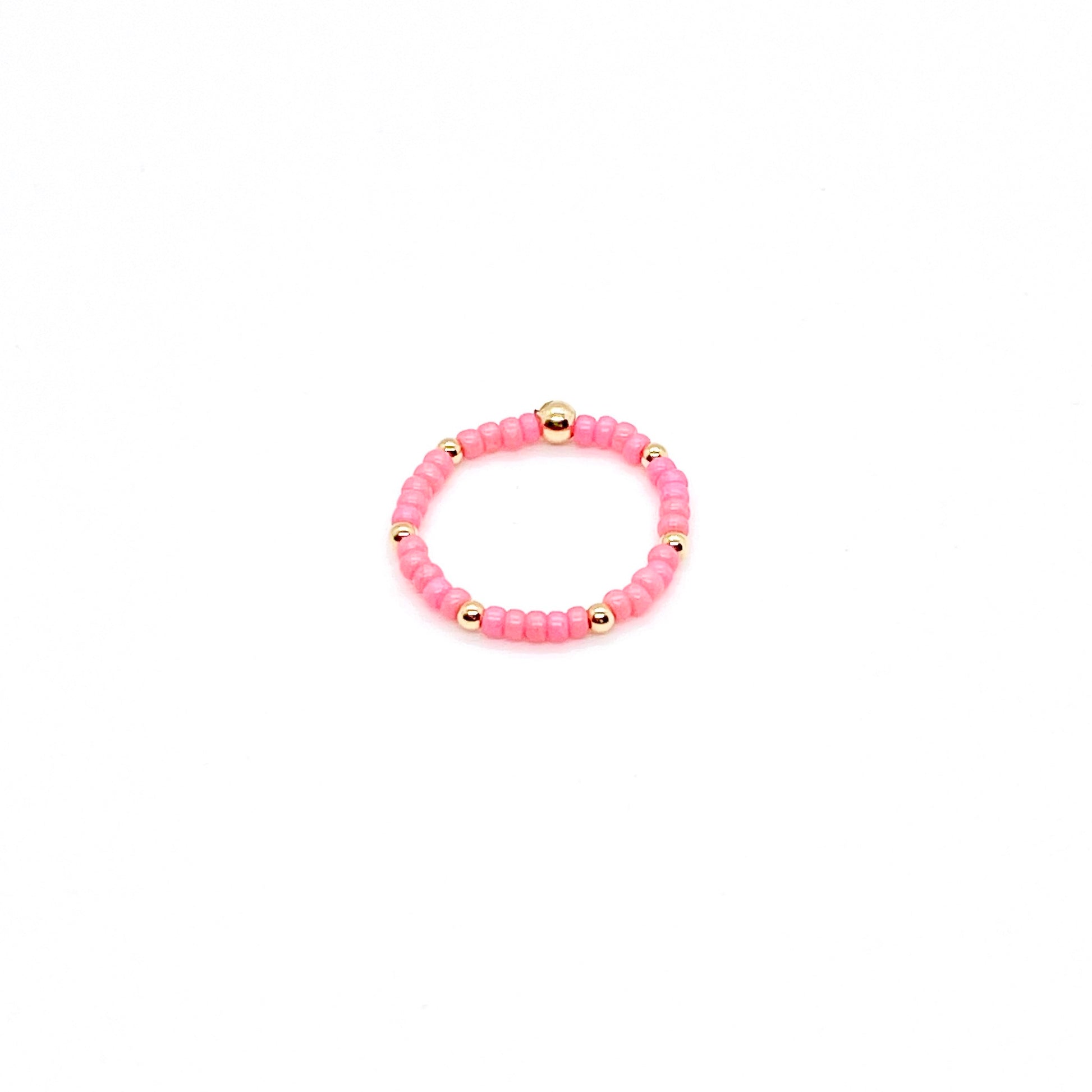 Stretch ring with pink seed beads and 2mm 14k gold-fill waterproof accent ball beads.